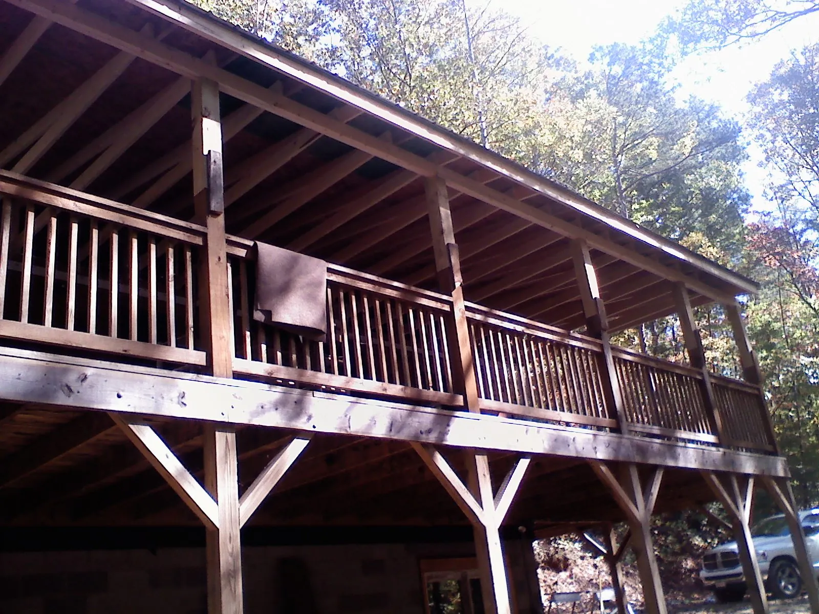 Timber framing under a new elevated porch and deck — Roof Leak Repair in Pinesdale by Roofing Brothers